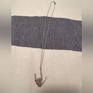 Skeleton hand-American sign language ‘I love you’ necklace.